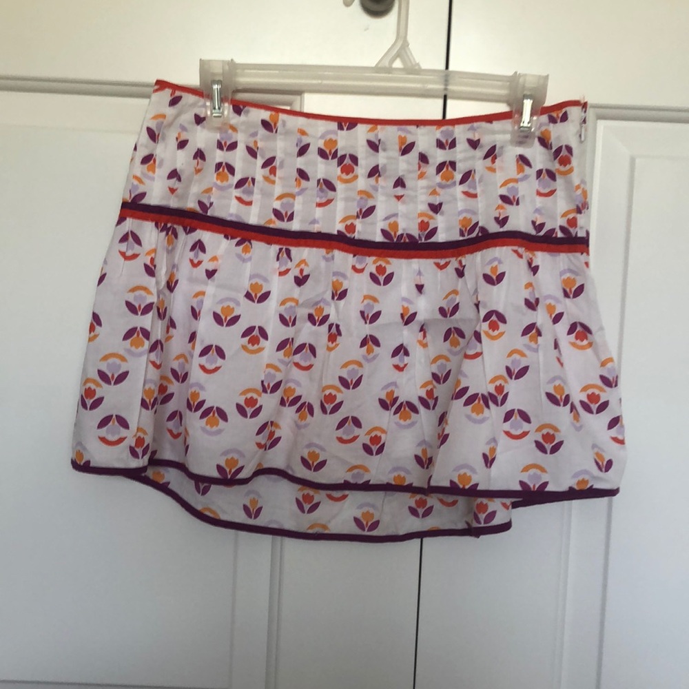 ORANGE AND PURPLE PLEATED MINI SKIRT